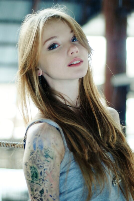 Woman with Tattoos — Brown, Neutral, Photograph, Long Hair