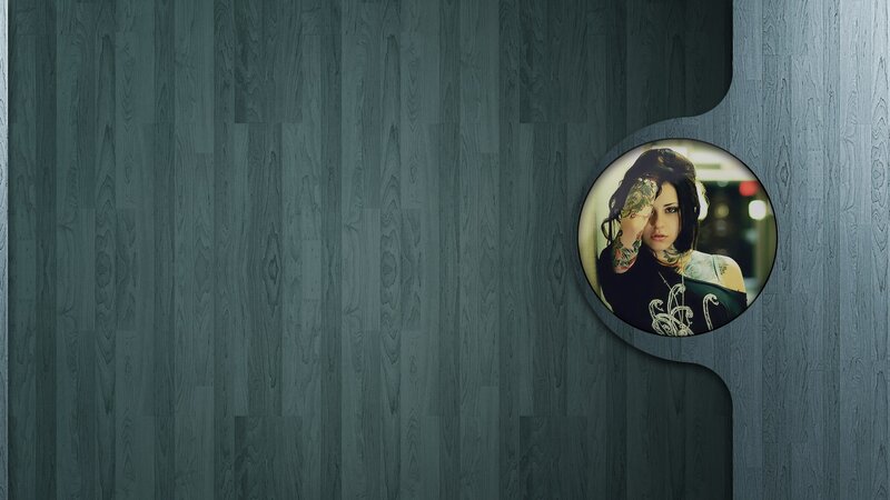 woman with tattoos in circular frame
