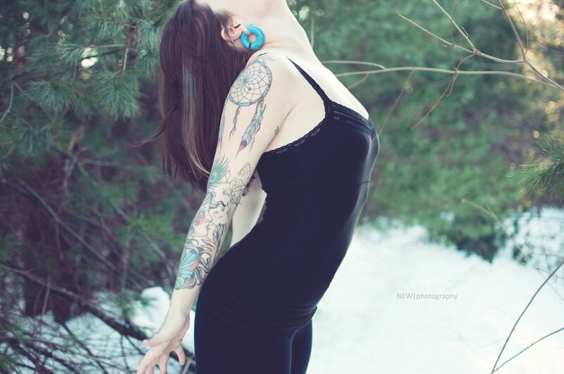 Woman with Tattoos in Forest — Black, Serene