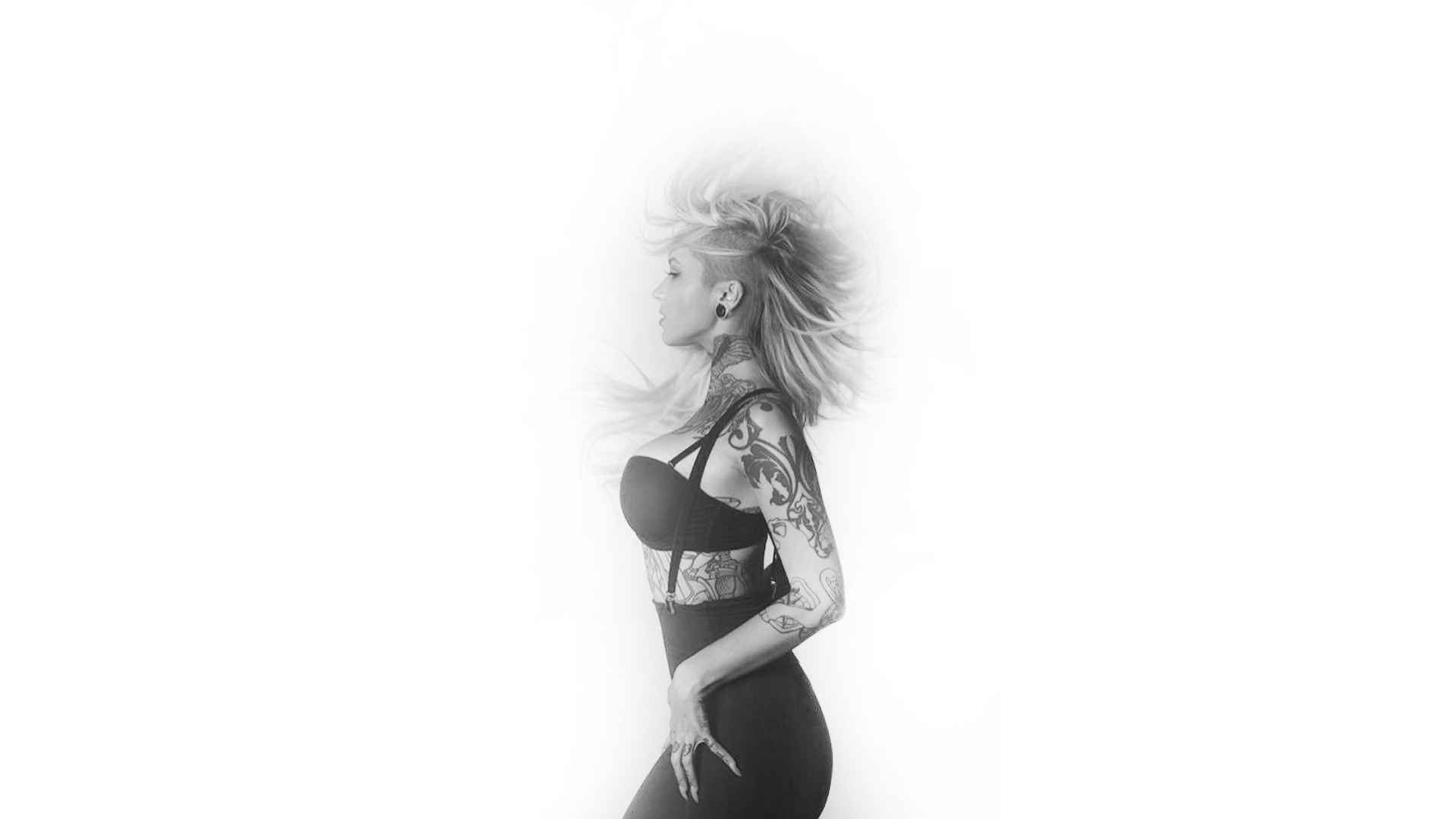 woman with tattoos in motion