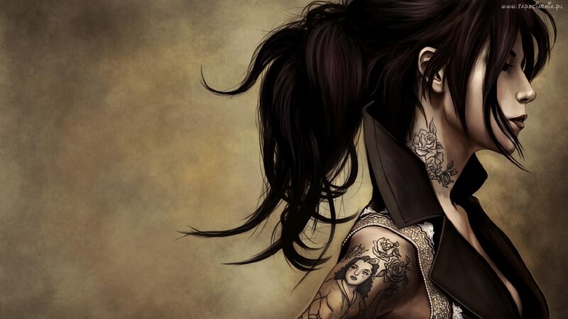 woman with tattoos in profile