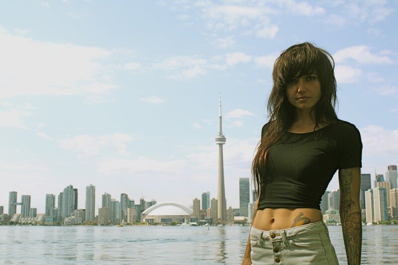 Woman with tattoos in Toronto