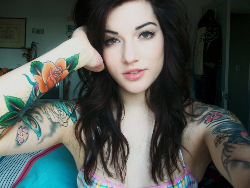 woman with tattoos on arms