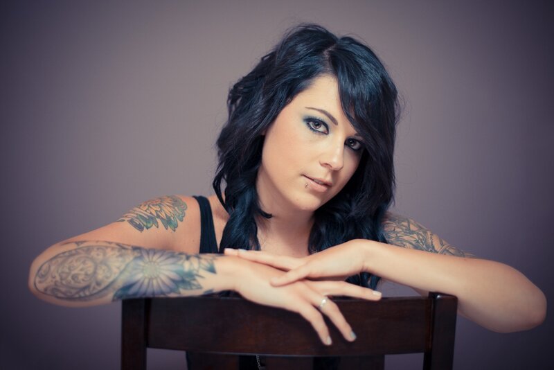 woman with tattoos on arms