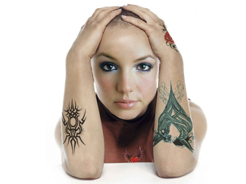 woman with tattoos on arms