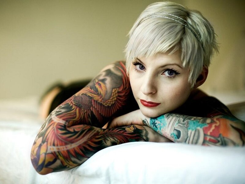 woman with tattoos on arms