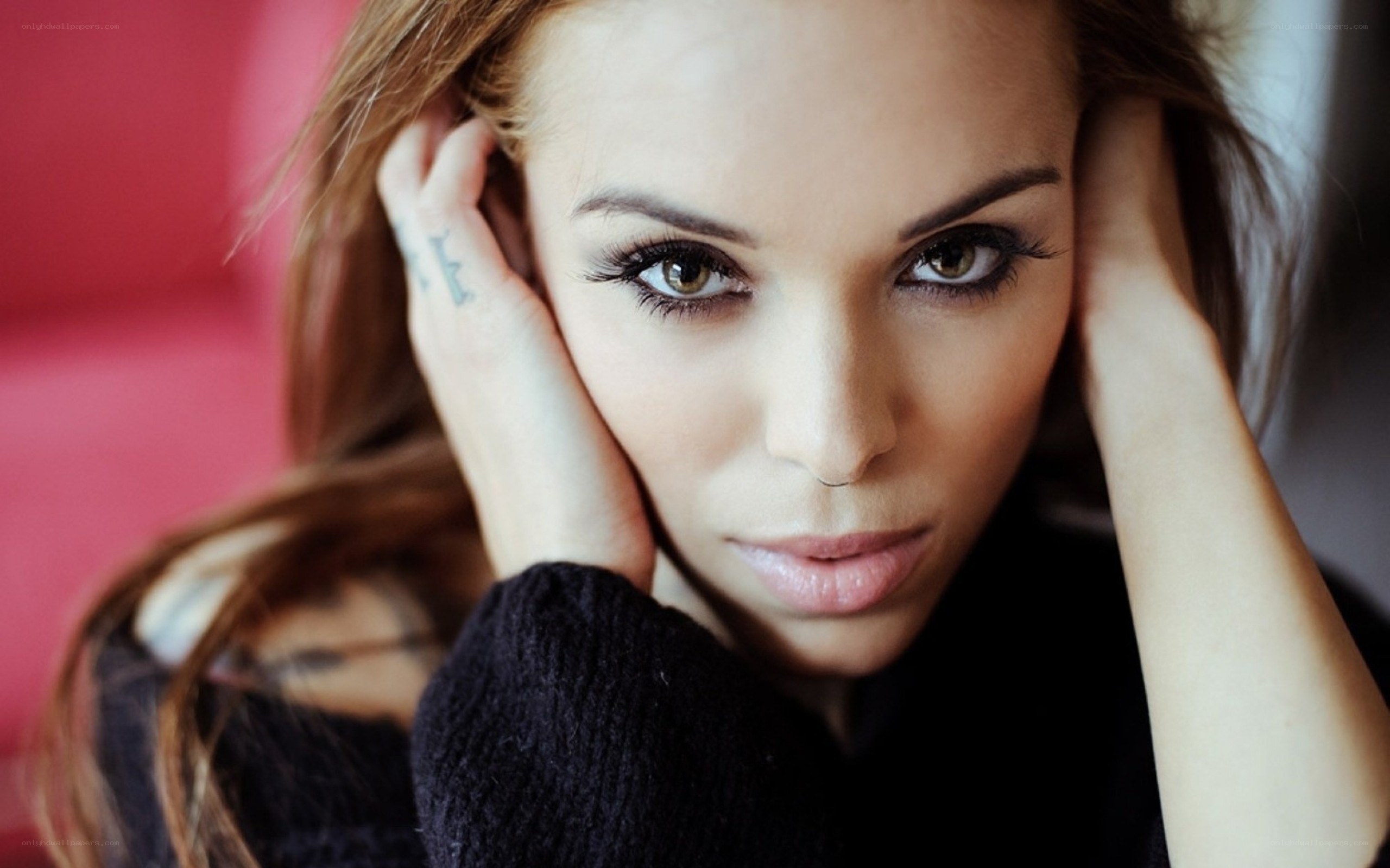 woman with tattoos on hands