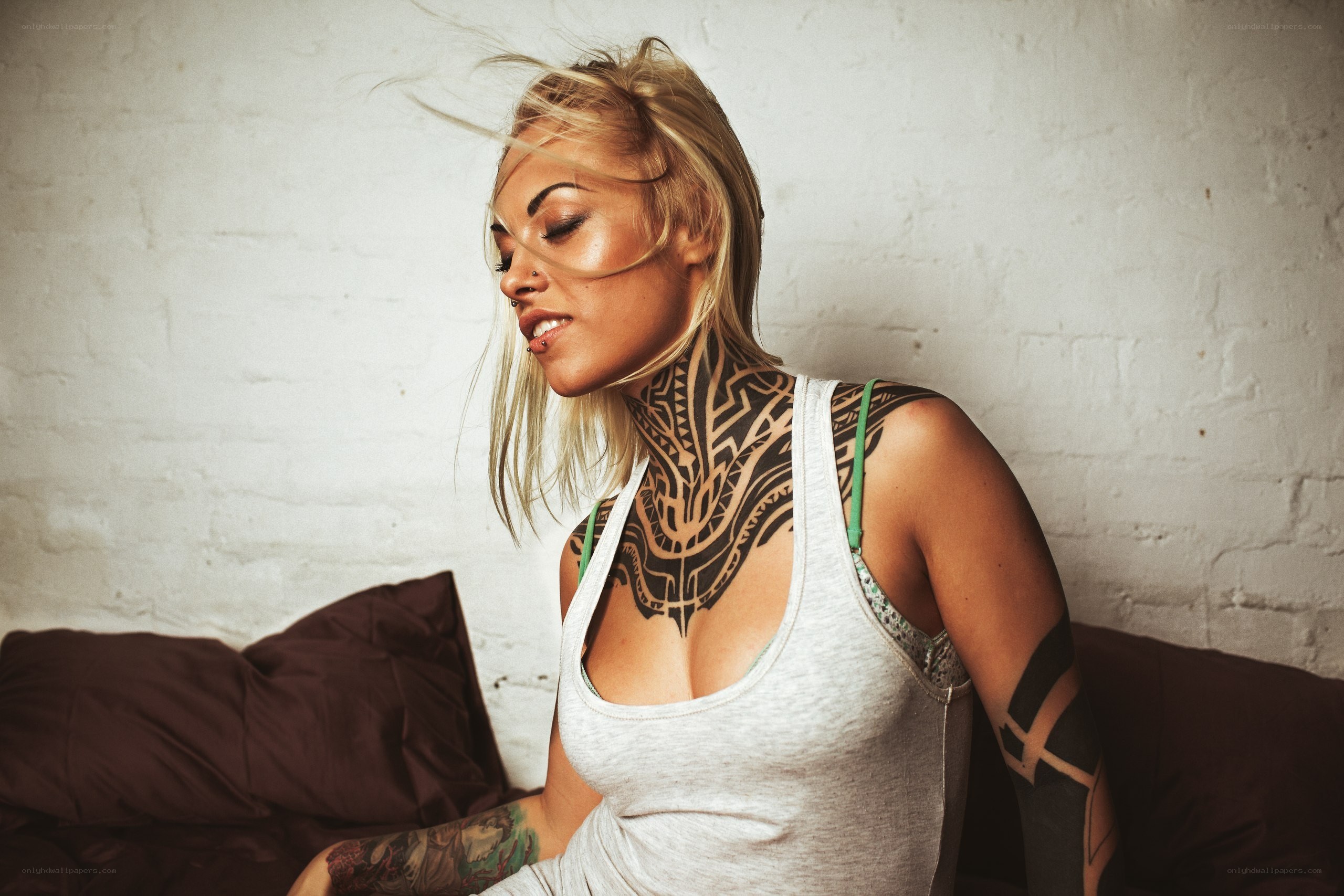 woman with tattoos on neck