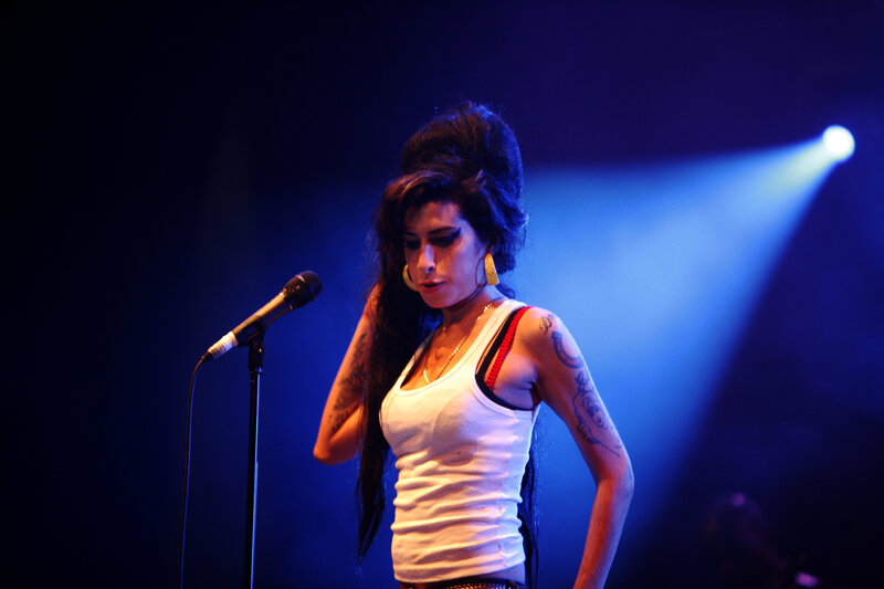 Woman with Tattoos on Stage