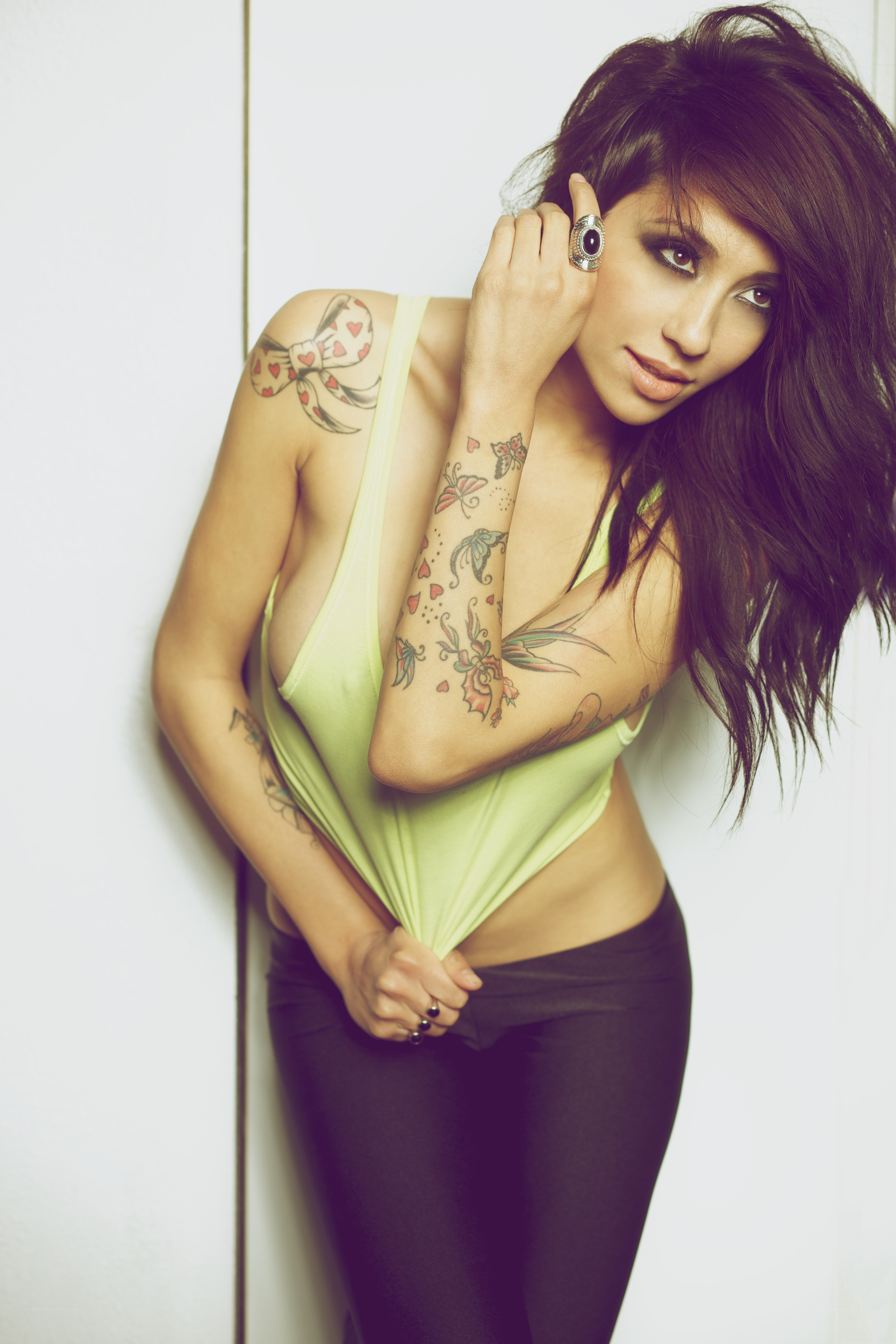 woman with tattoos posing