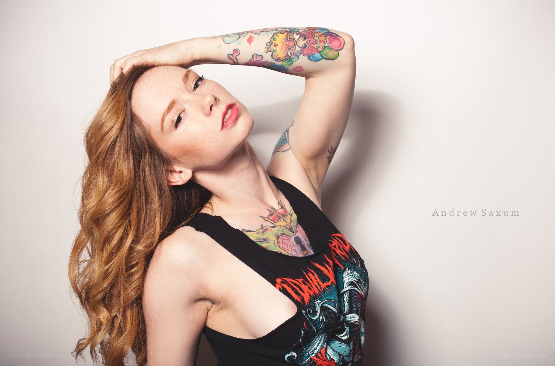 woman with tattoos posing