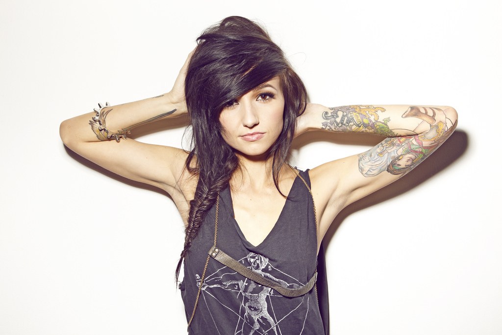 woman with tattoos posing