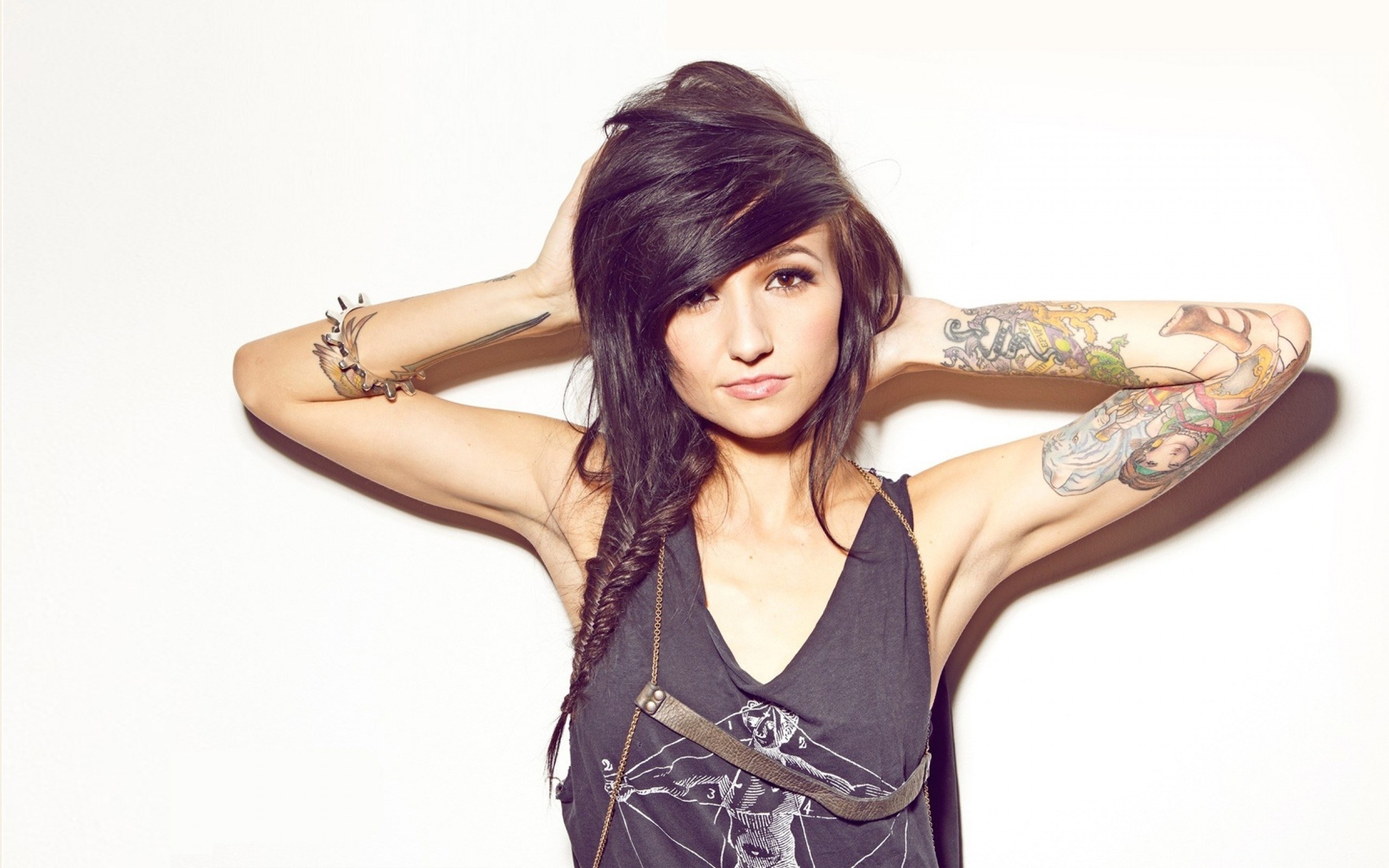 woman with tattoos posing