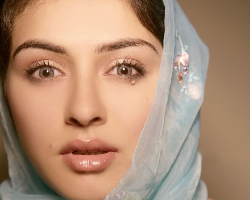 woman with tear and headscarf