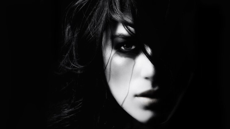 woman with tear in black and white