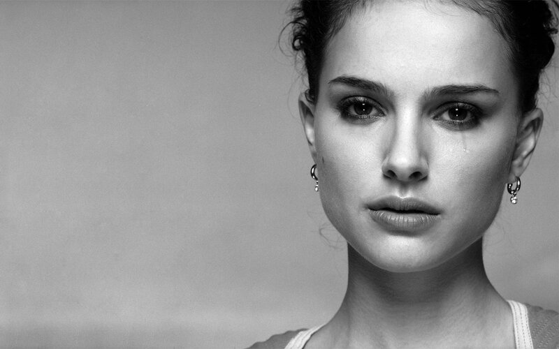 woman with tear in black and white