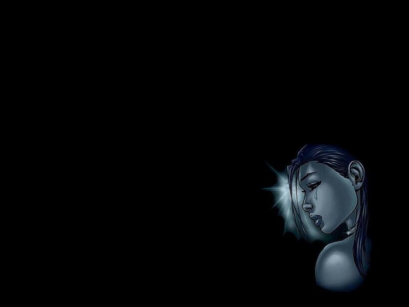 woman with tear in dark