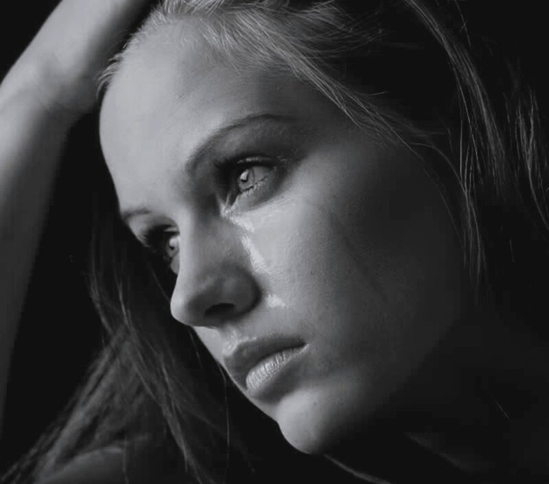 Woman with Tear on Cheek — Black, Dramatic