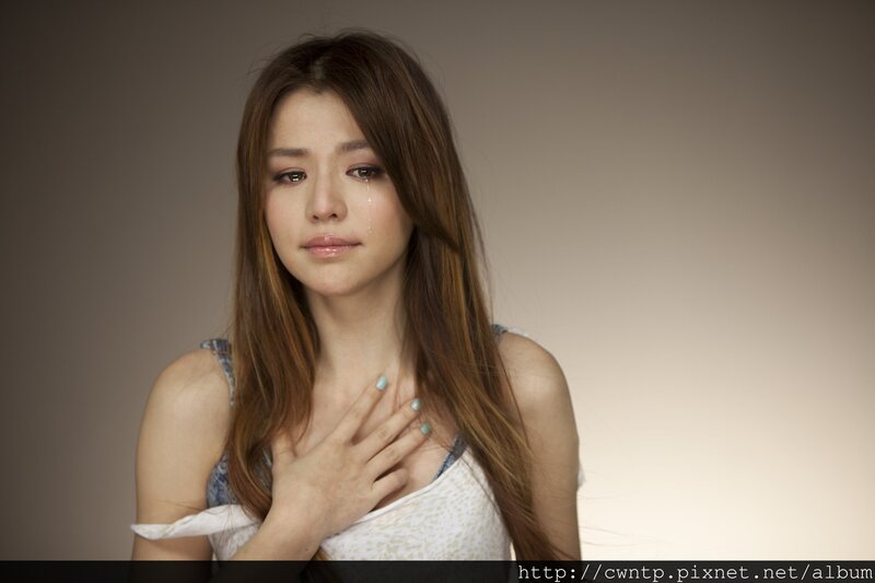 Woman with Tear on Cheek — Brown, Sad, Photograph, Hand