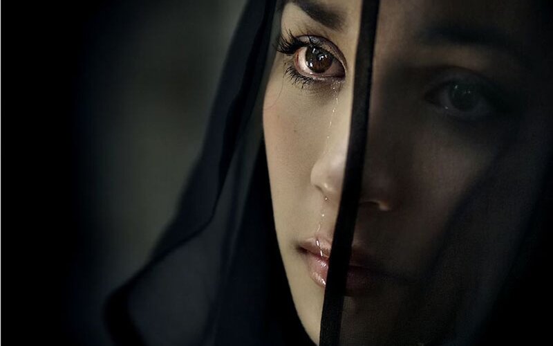 Woman with Tear on Face