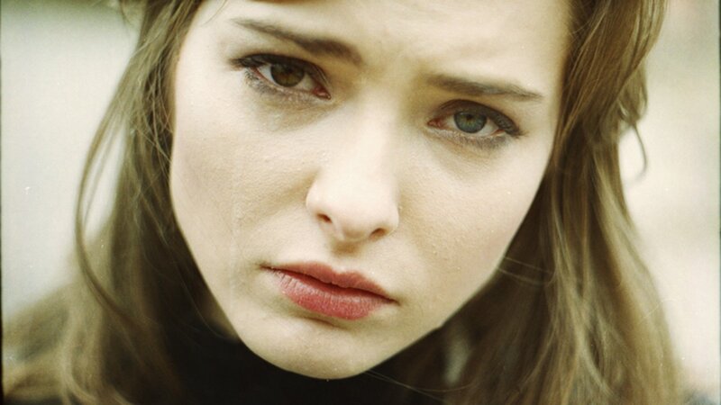woman with tear-streaked face