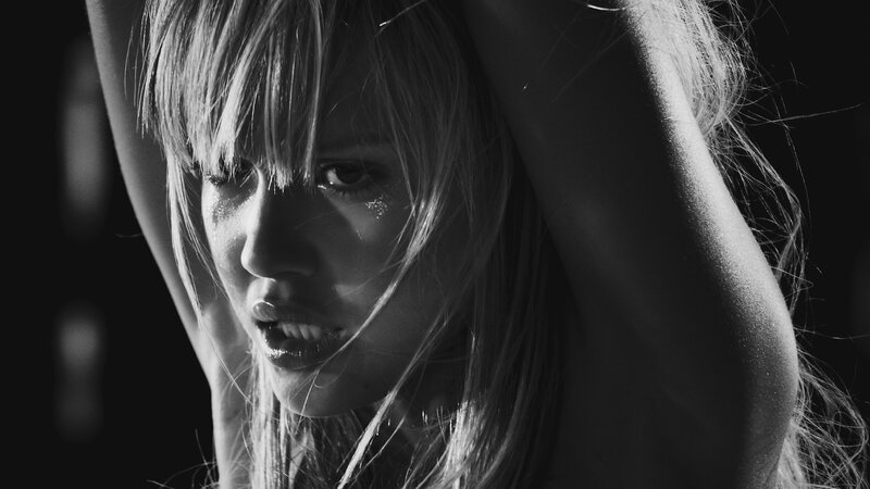 woman with tears in black and white