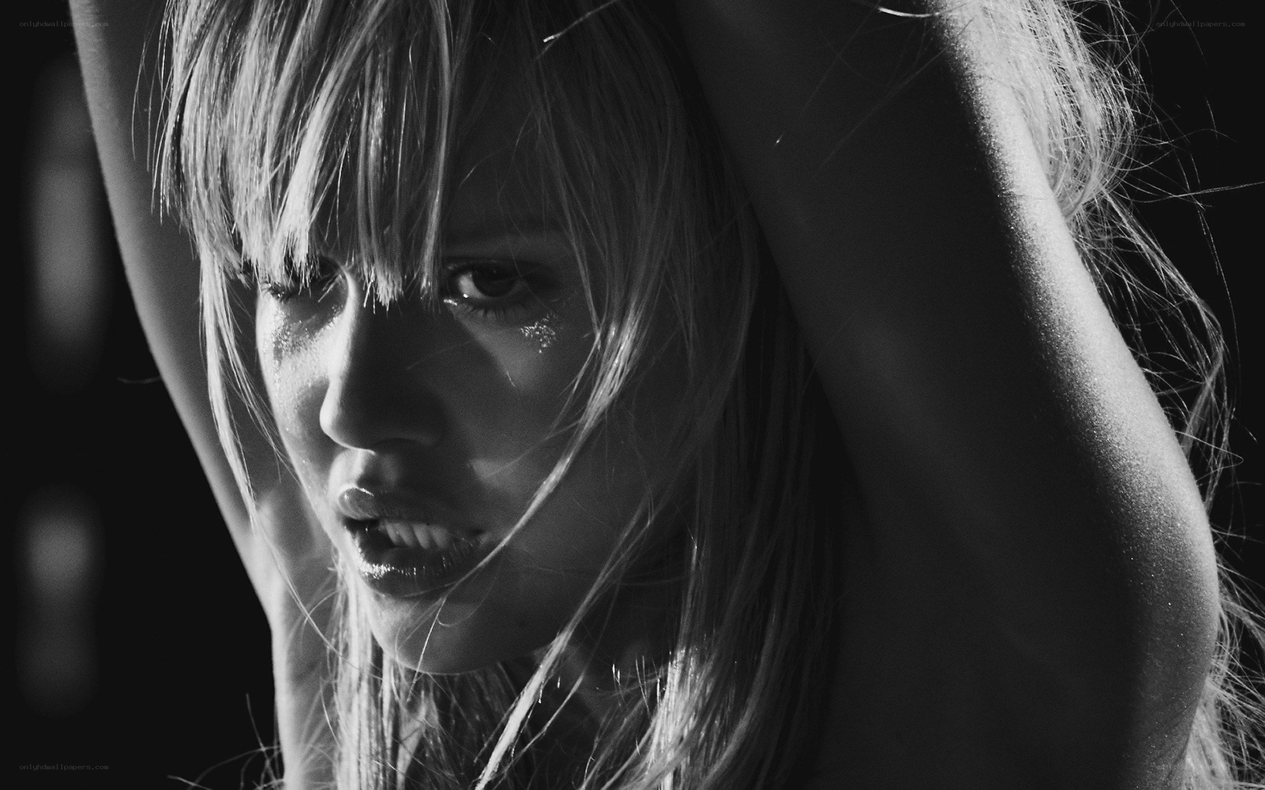 woman with tears in black and white