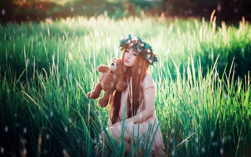 Woman with Teddy Bear — Green, Serene, Sunset