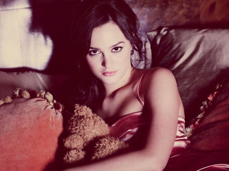 woman with teddy bear on couch