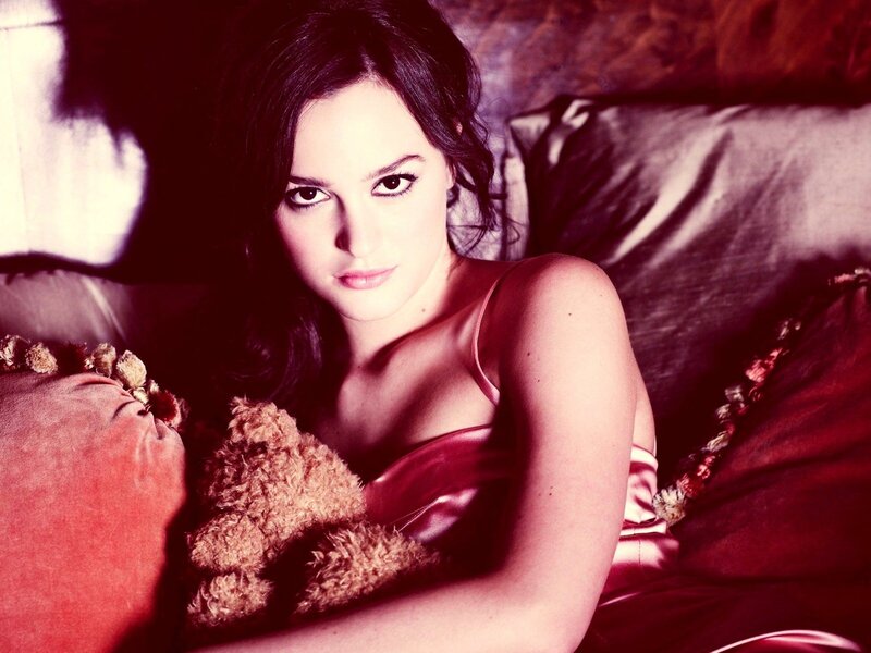 woman with teddy bear on couch