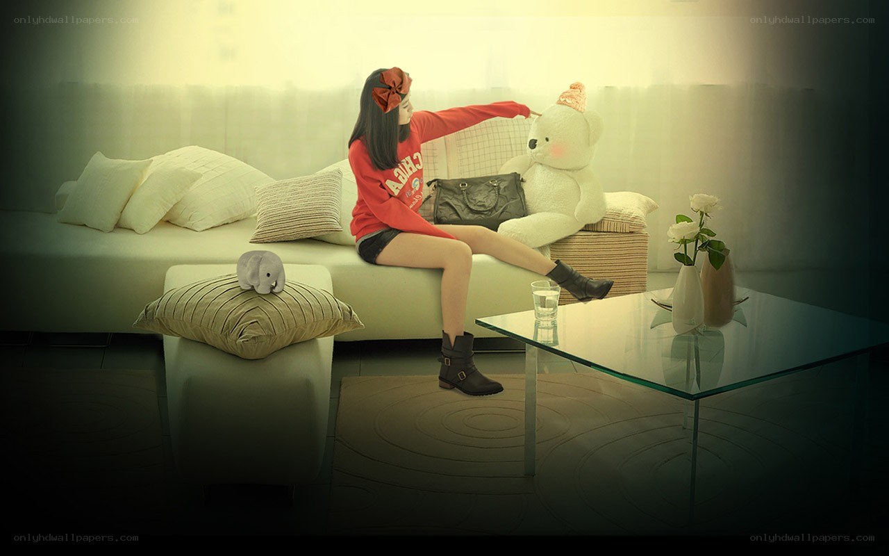 woman with teddy bear on sofa