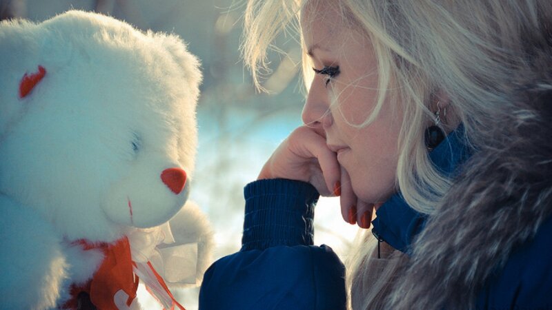 Woman with Teddy Bear — White, Contemplative, Winter