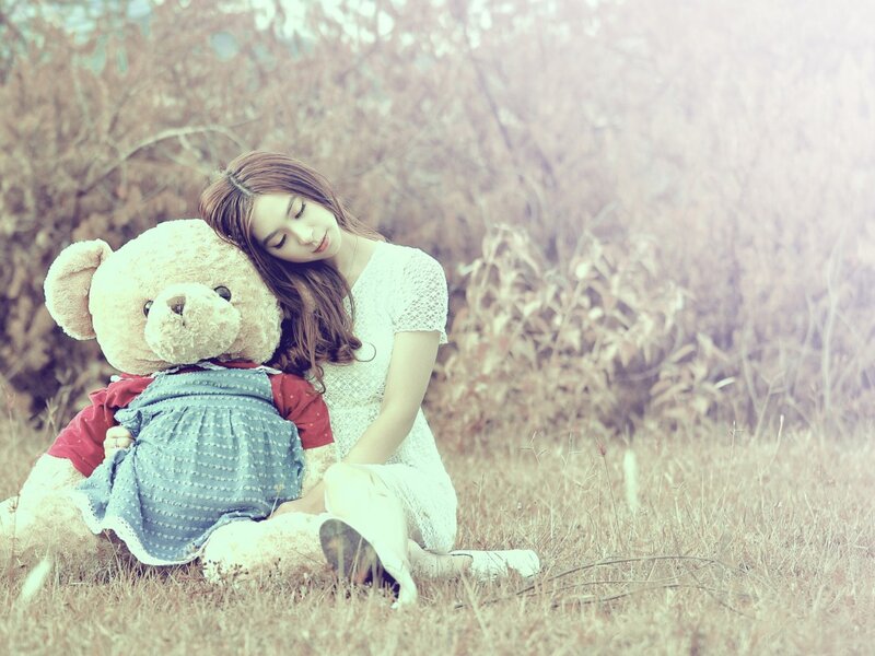 Woman with Teddy Bear — White, Serene, Afternoon
