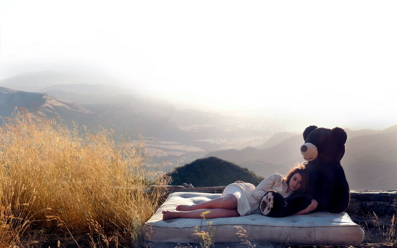 Woman with Teddy Bear — White, Serene