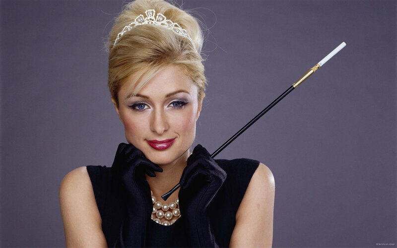 woman with tiara and cane