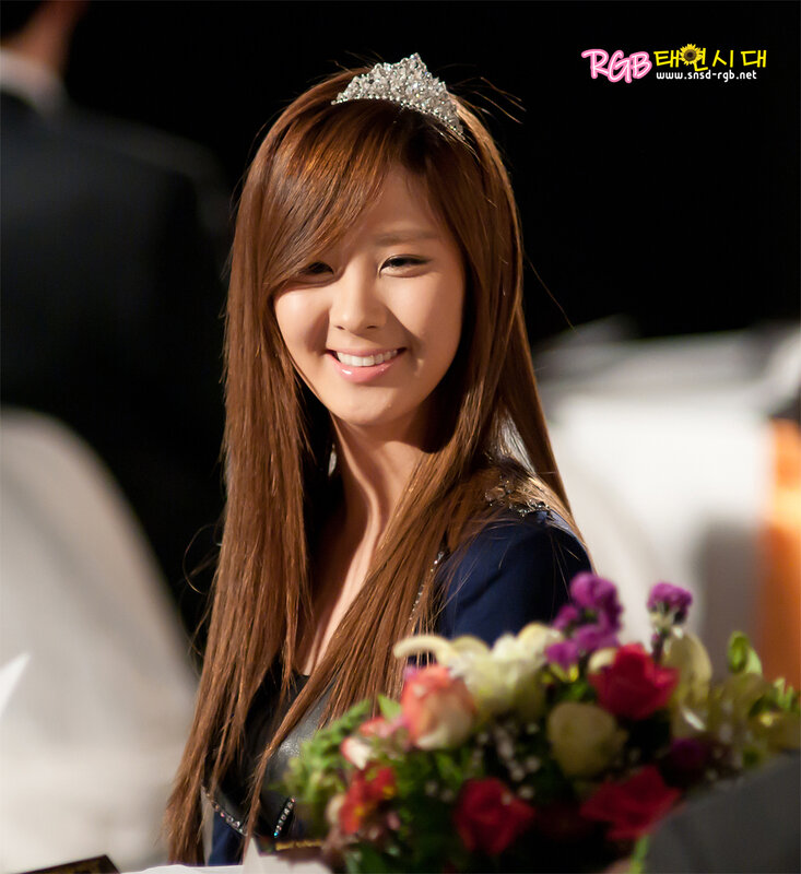 Woman with Tiara and Flowers