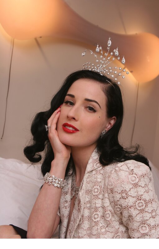 woman with tiara and red lipstick