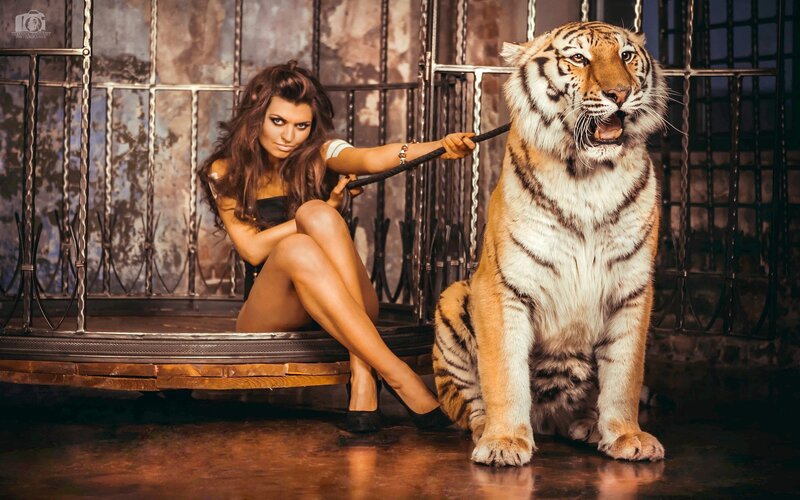 Woman with Tiger in Cage