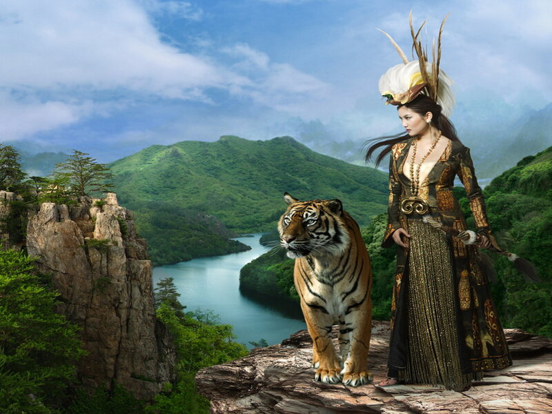 Woman with Tiger on Cliff