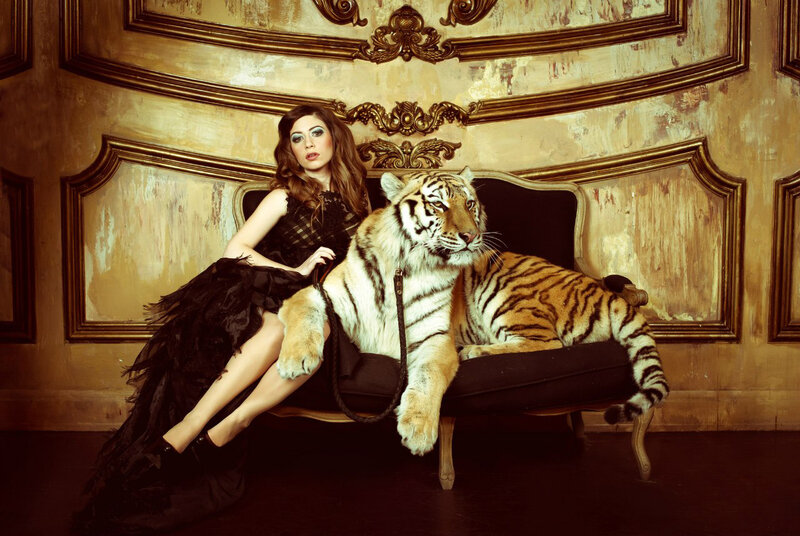 Woman with Tiger on Couch