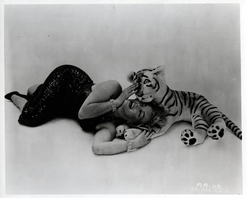 Woman with tiger plush toy