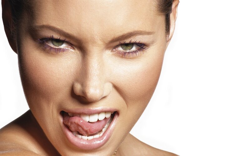 Woman with Tongue Out — White, Intense, Photograph