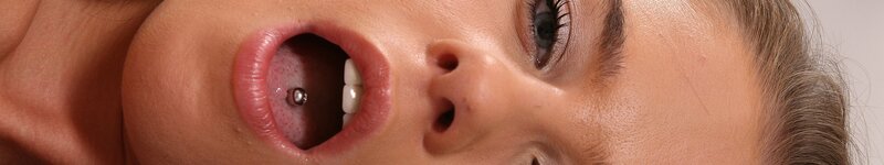 woman with tongue piercing