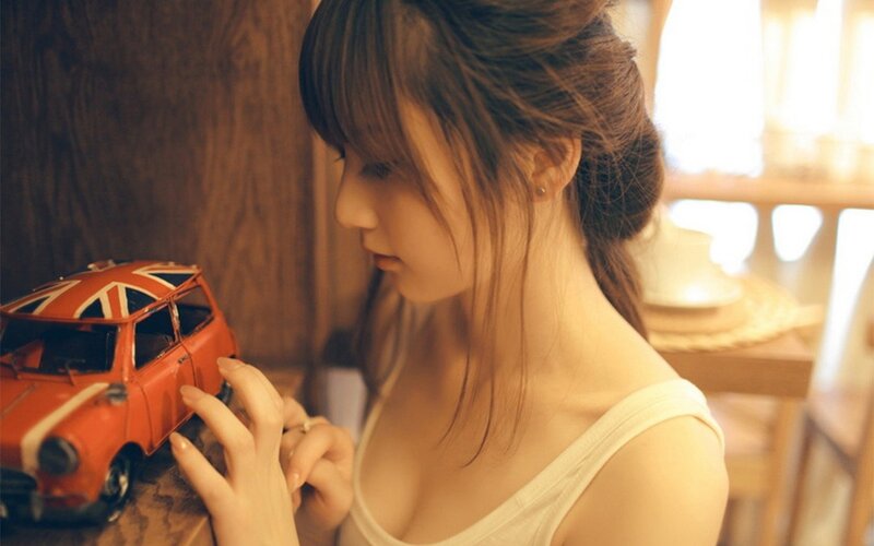 woman with toy car