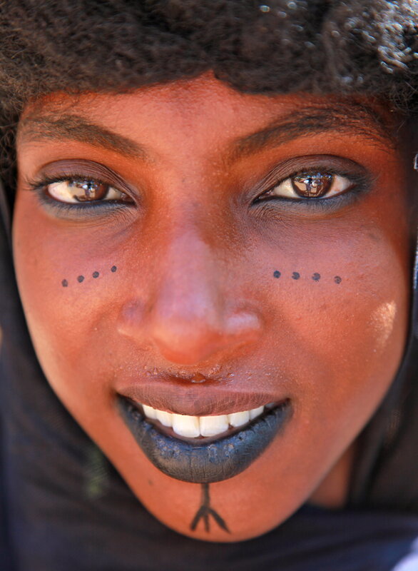 woman with traditional face paint