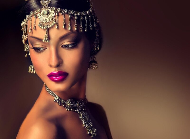 Woman with Traditional Jewelry — Brown, Dramatic