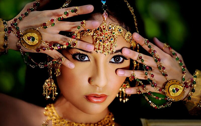 Woman with Traditional Jewelry — Gold, Dramatic