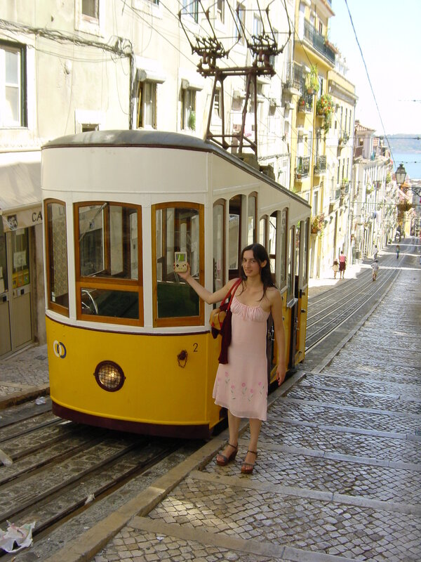 Woman with tram in Lisbon