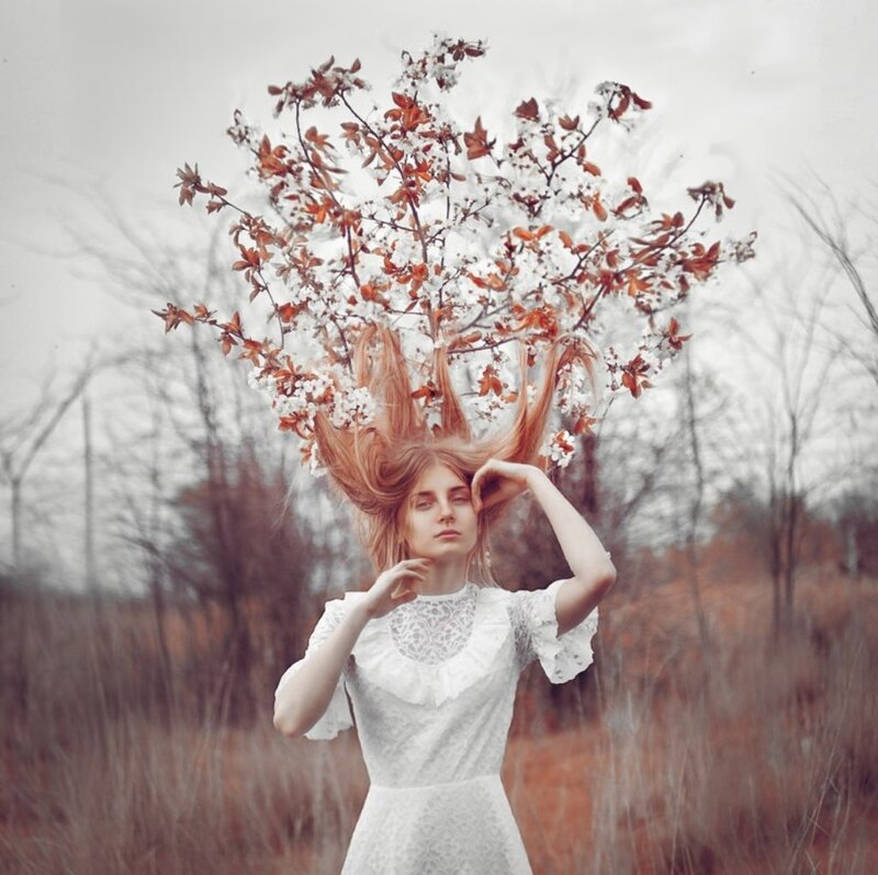 Woman with Tree Branches in Hair