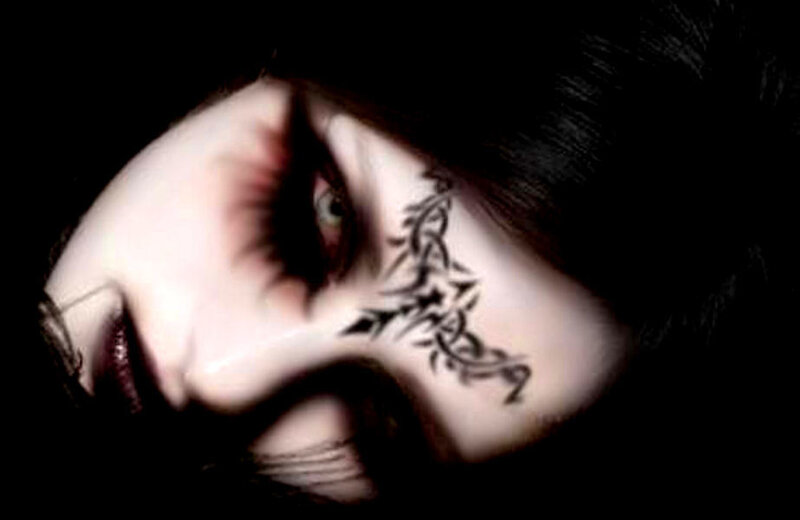 woman with tribal tattoo